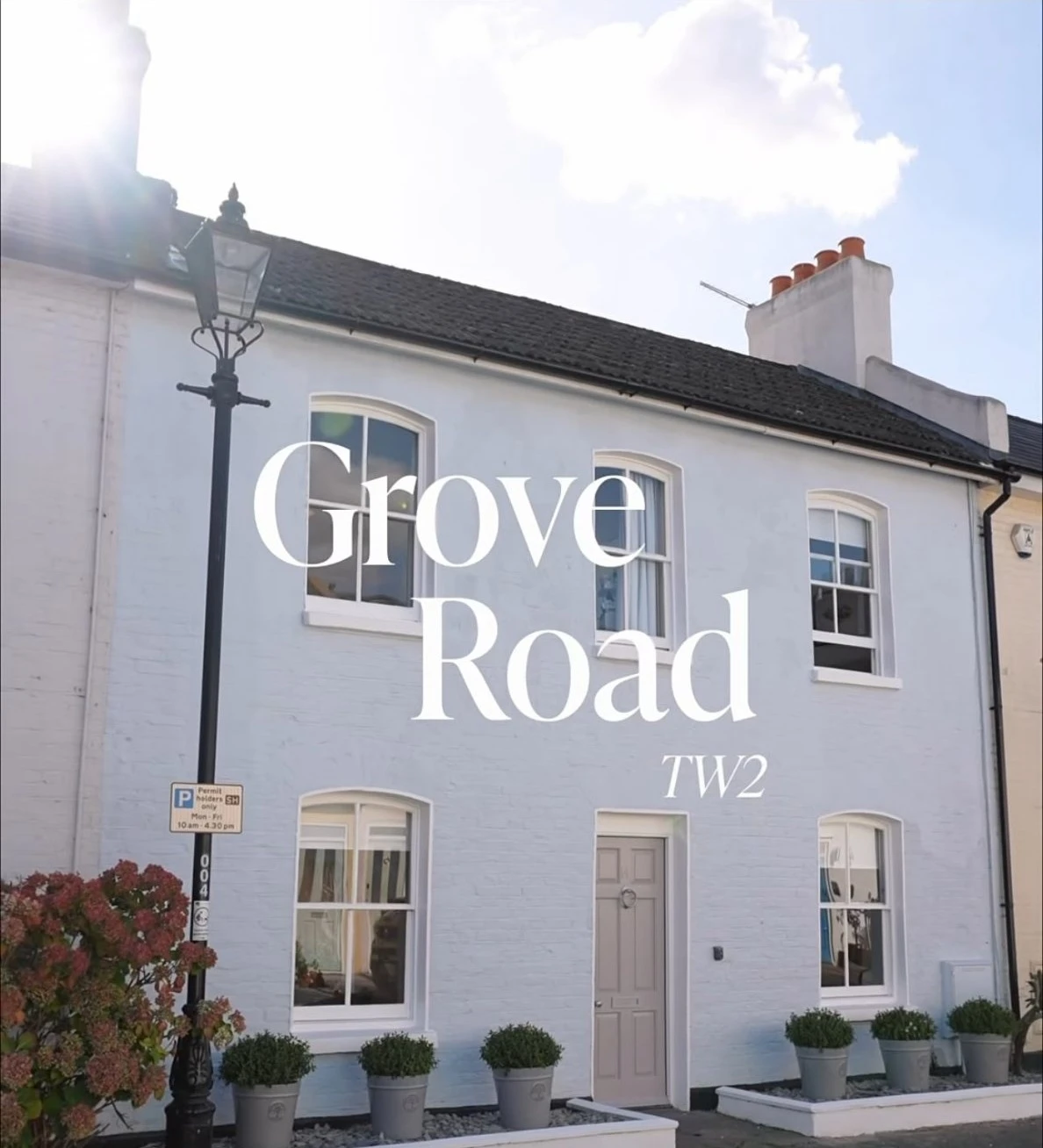Freshly painted white terraced house front