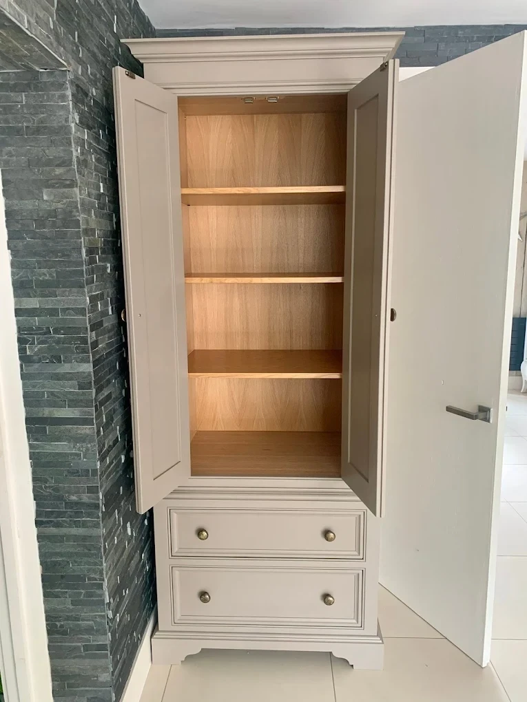 Painted freestanding cupboard with oak shelf interior