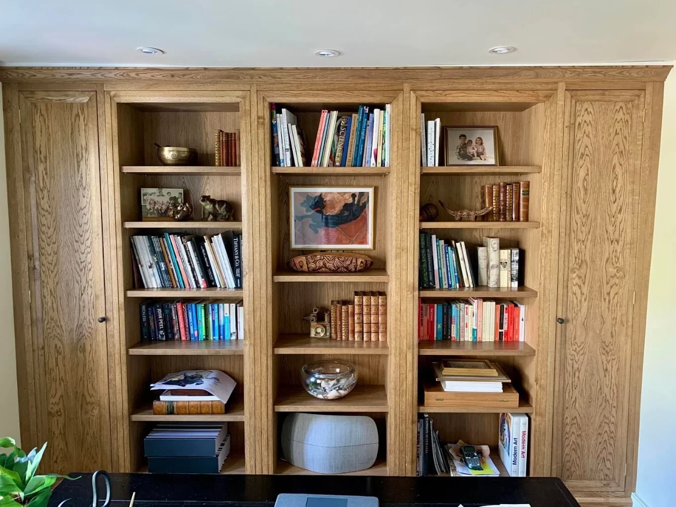 Oak bookcase and cabinetry finished with a protective wood treatment